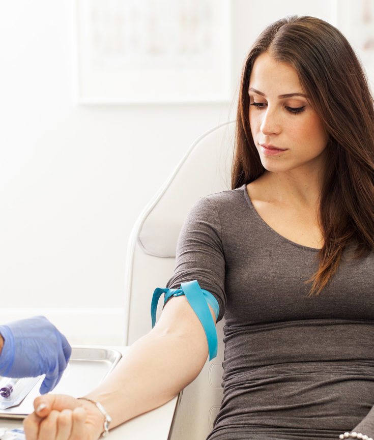 Photo of woman taking blood test